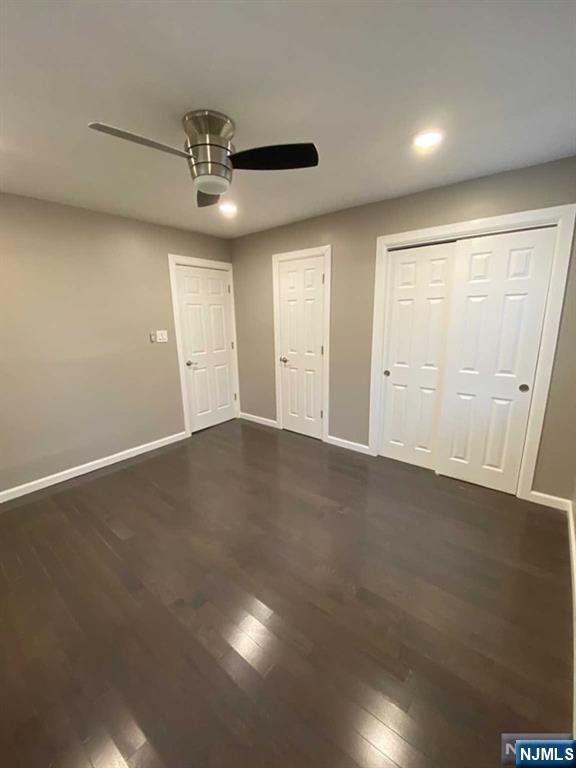 79 East Ridgewood Avenue Paramus, NJ 07652 - Photo 12 of 31 an empty room with a empty space and windows