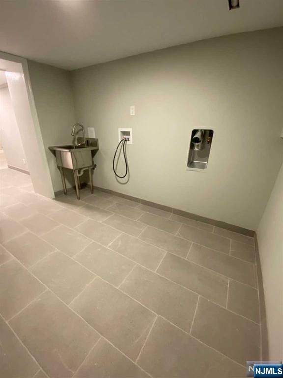 79 East Ridgewood Avenue Paramus, NJ 07652 - Photo 26 of 31 a view of a room with rack on the wall