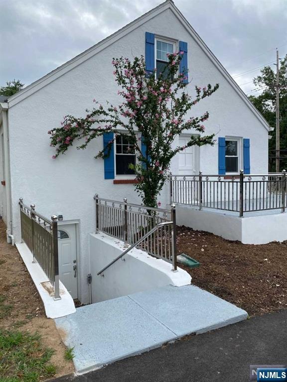 79 East Ridgewood Avenue Paramus, NJ 07652 - Photo 27 of 31 a view of a house with a yard