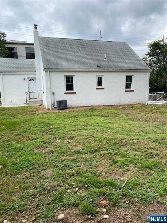 79 East Ridgewood Avenue Paramus, NJ 07652 - Photo 29 of 31 a view of a house with a backyard