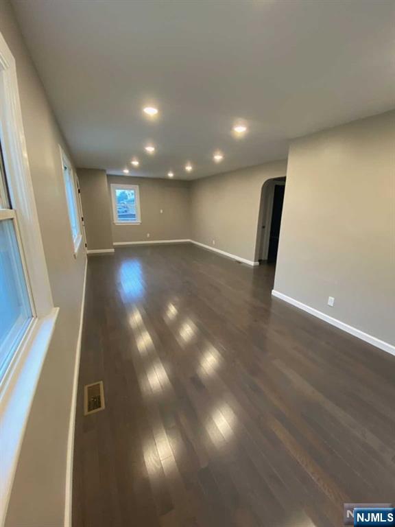 79 East Ridgewood Avenue Paramus, NJ 07652 - Photo 3 of 31 a view of an empty room with wooden floor