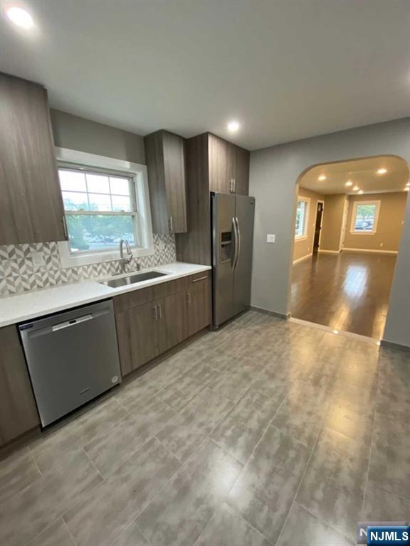 79 East Ridgewood Avenue Paramus, NJ 07652 - Photo 10 of 31 a view of a kitchen with a sink and cabinets
