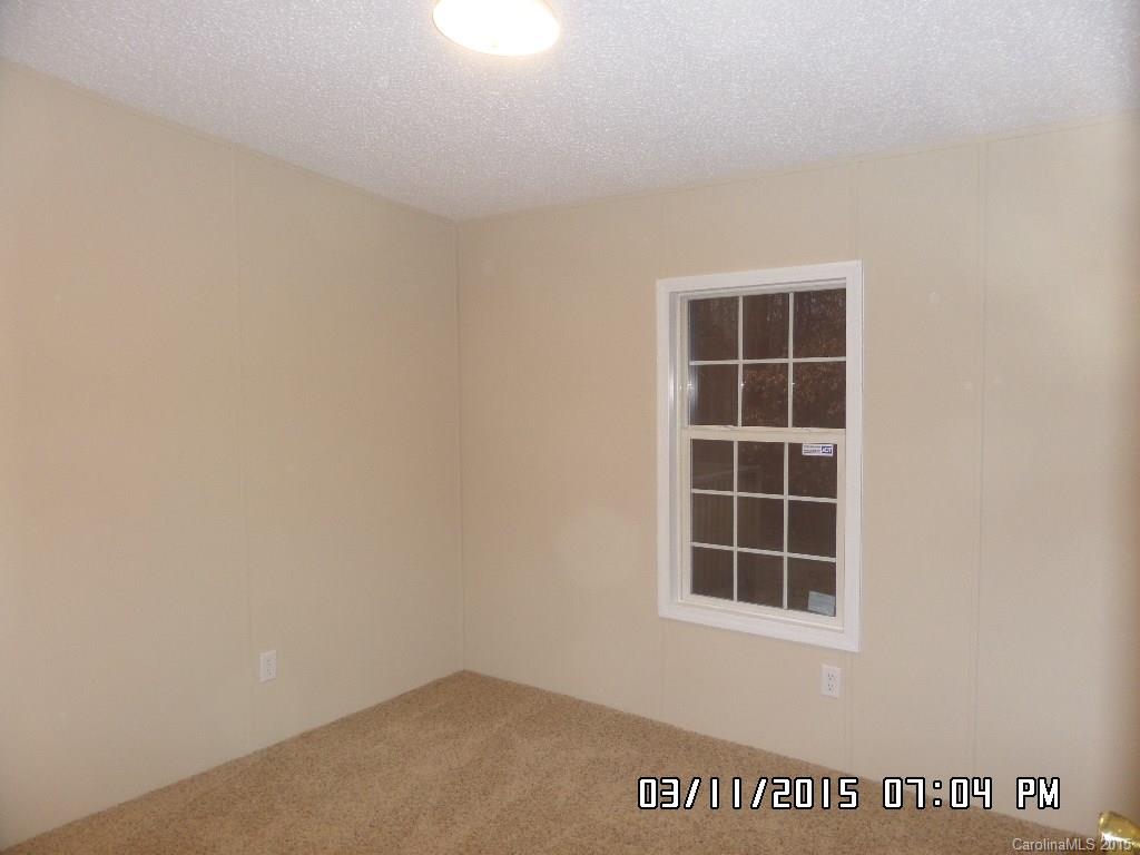293 Sailwinds Road Mooresville, NC 28115 - Photo 12 of 15 an empty room with windows
