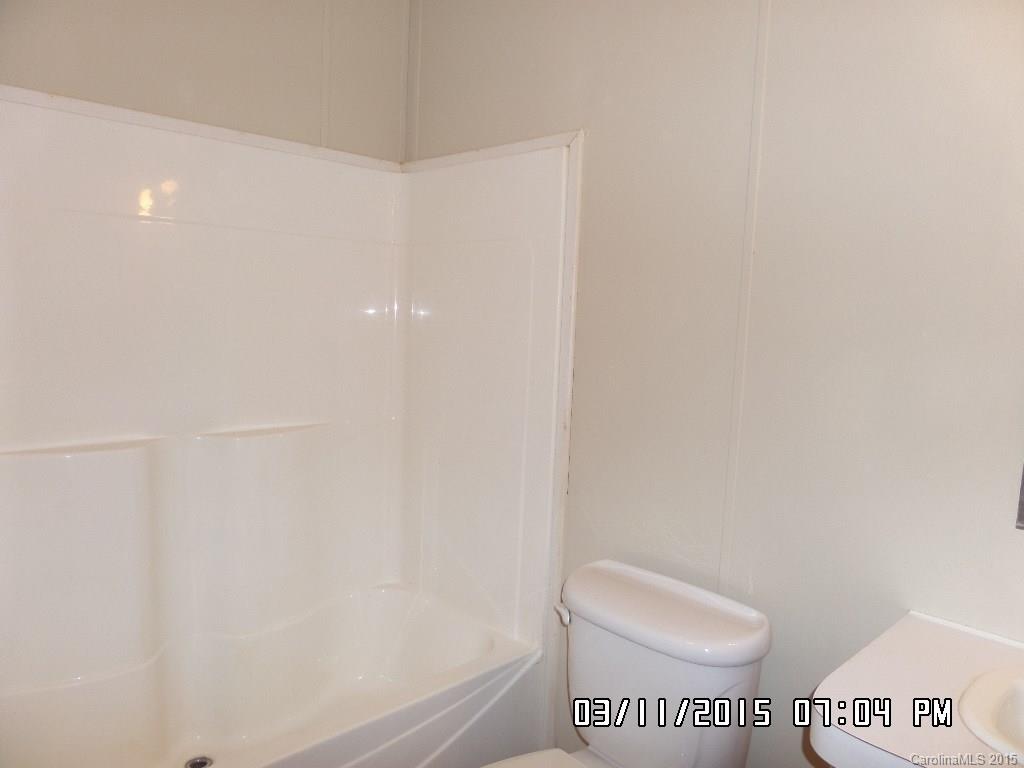293 Sailwinds Road Mooresville, NC 28115 - Photo 13 of 15 a bathroom with a toilet and a shower