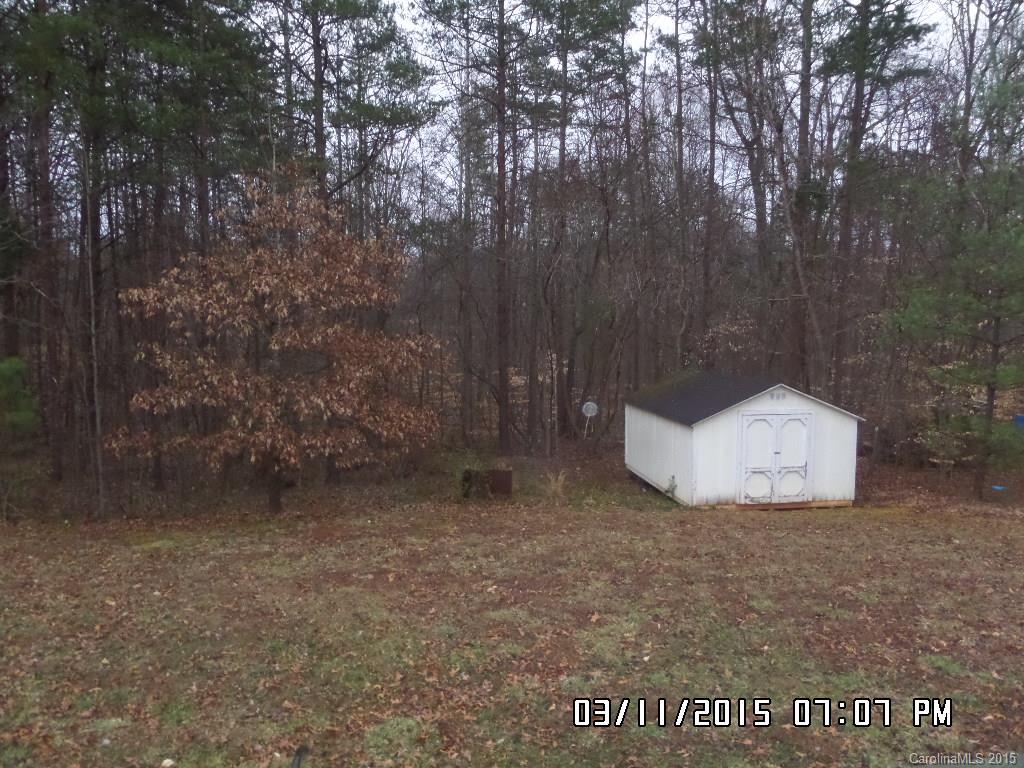 293 Sailwinds Road Mooresville, NC 28115 - Photo 14 of 15 a view of a dry yard with trees