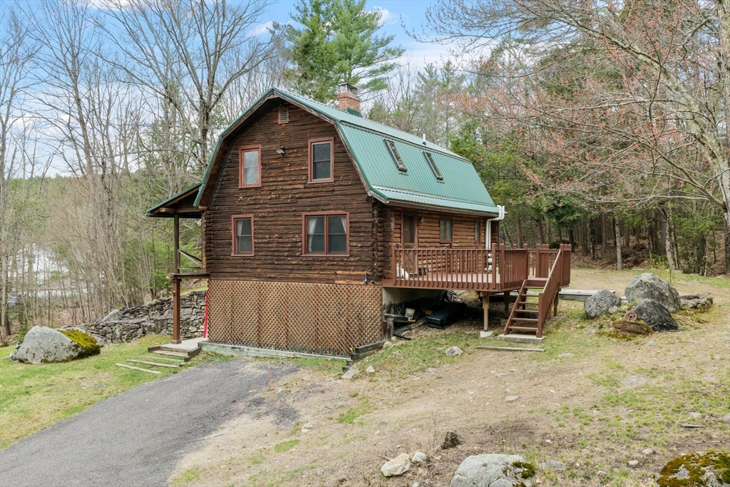 43 Greenville Road Townsend, MA 01474 - Photo 3 of 42 a front view of a house with a yard and garage