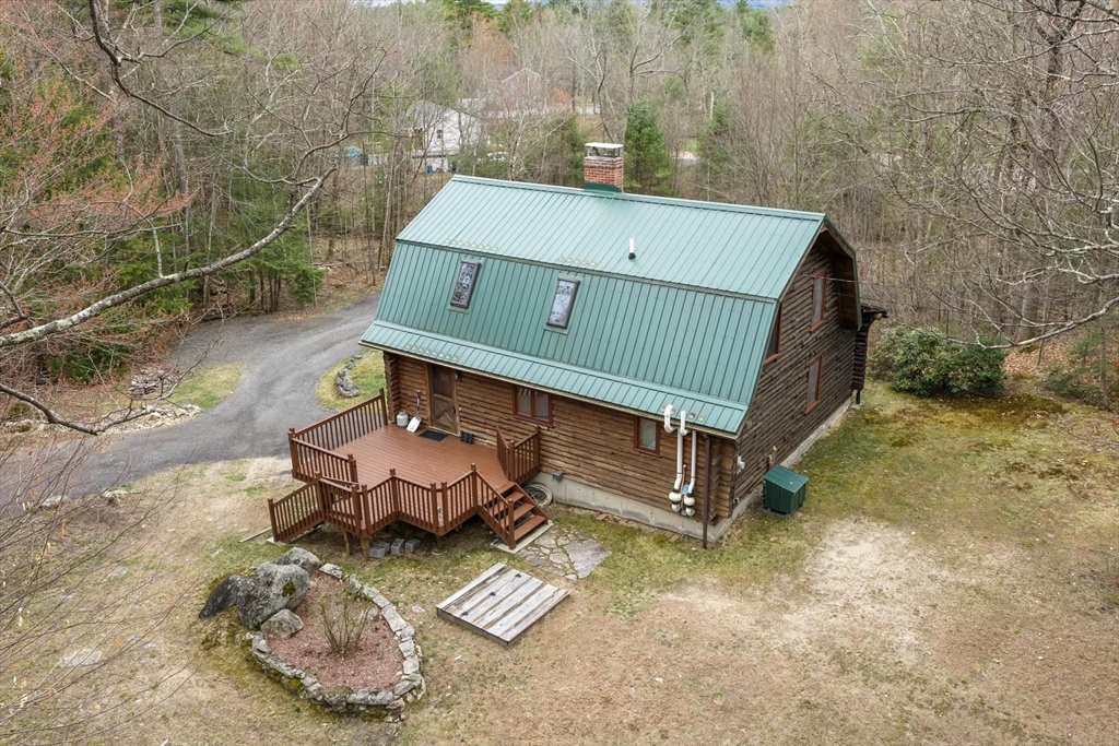 43 Greenville Road Townsend, MA 01474 - Photo 36 of 42 a view of a small house with a yard