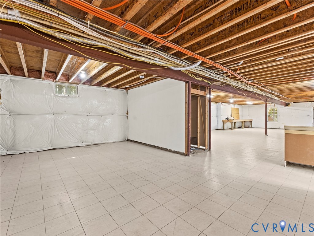 12 Henderson Road New Canton, VA 23123 - Photo 39 of 49 Expansive open area with light-toned tile flooring