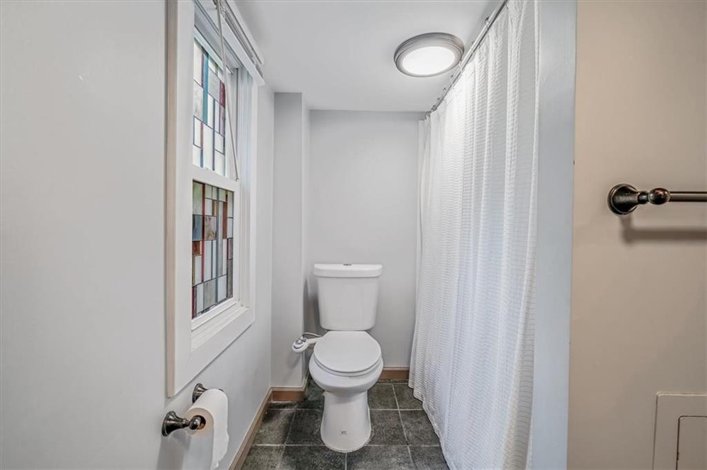 559 Boquet Street Carnegie, PA 15106 - Photo 12 of 20 a bathroom with a toilet and a shower