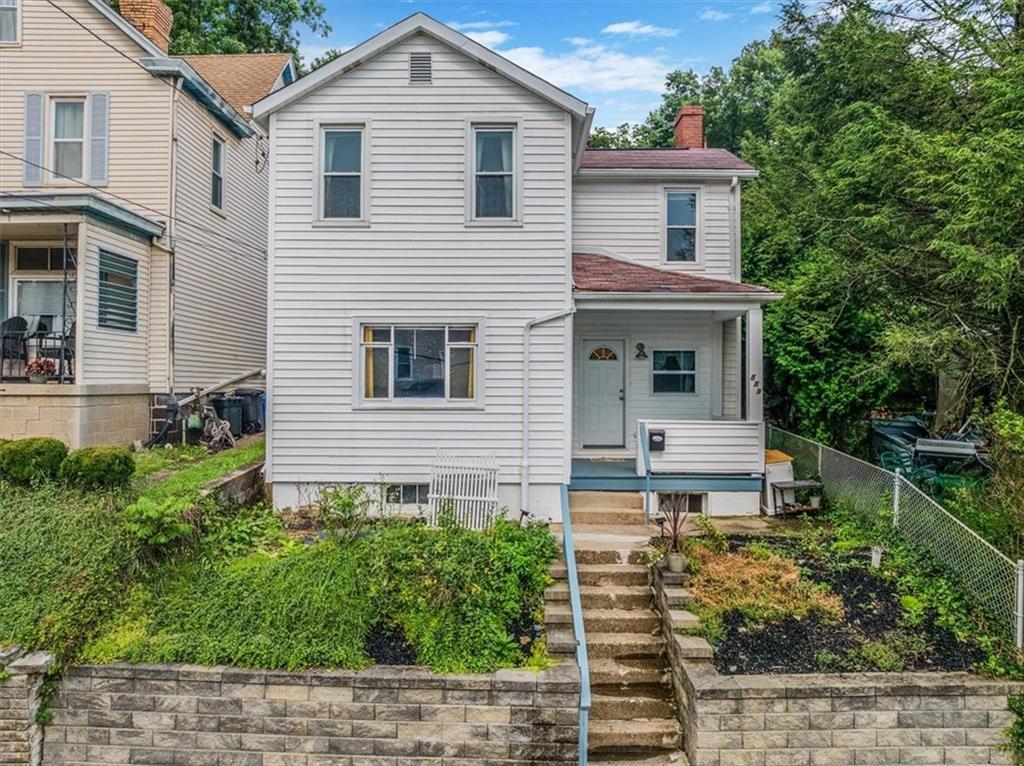 559 Boquet Street Carnegie, PA 15106 - Photo 2 of 20 a house view with a garden