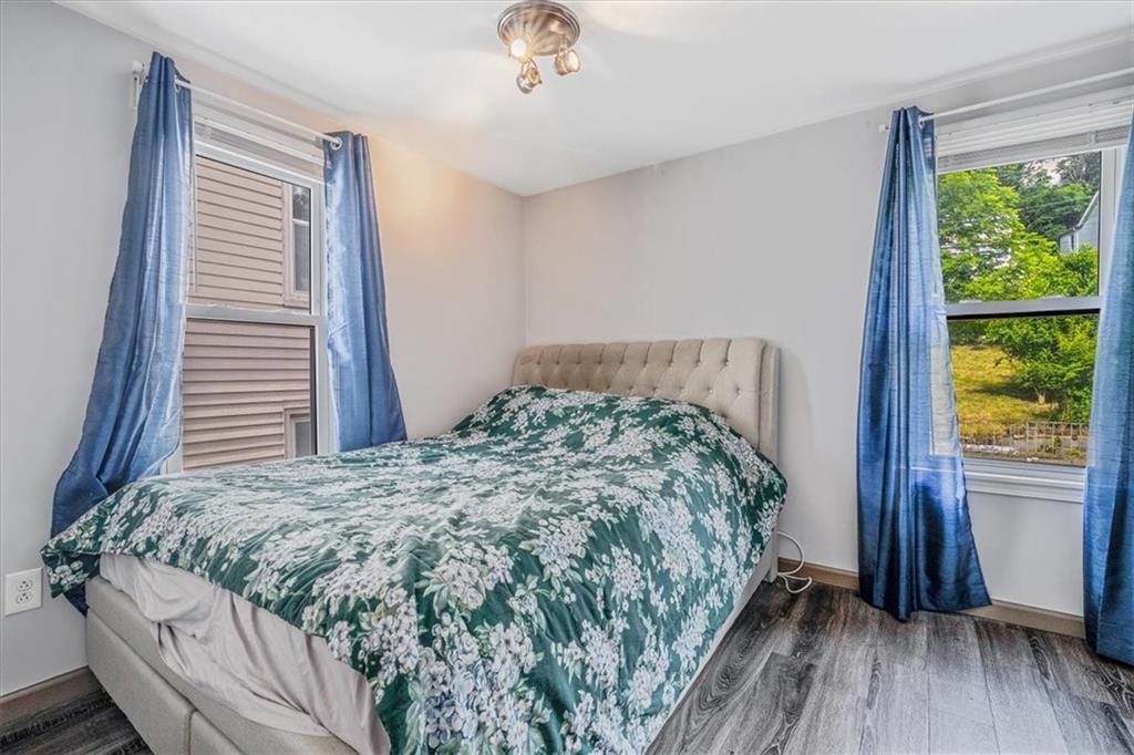559 Boquet Street Carnegie, PA 15106 - Photo 10 of 20 a bedroom with a bed and a window
