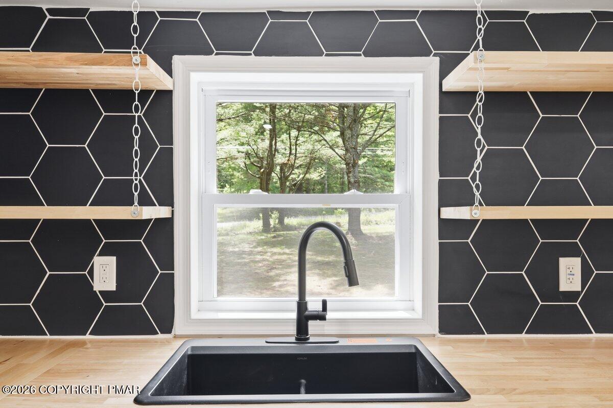 155 Blooming Grove Road Hawley, PA 18428 - Photo 21 of 41 a picture of a door and a floor to ceiling window