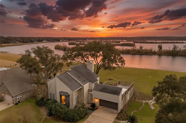 a view of a patio with lake view and mountain view