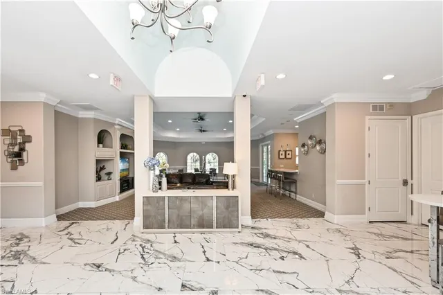 a view of a living room and kitchen view