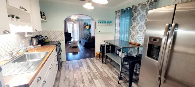 a view of a living room and dining room