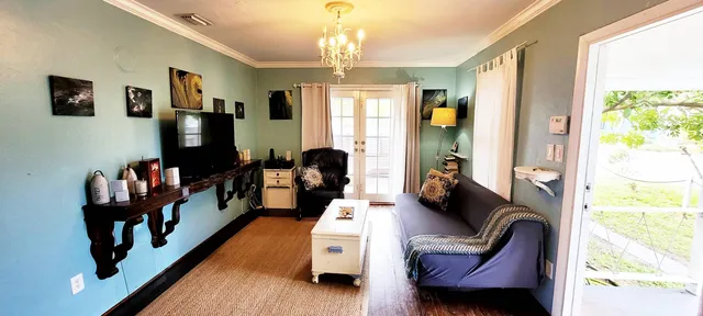 a living room with furniture or couch and a window