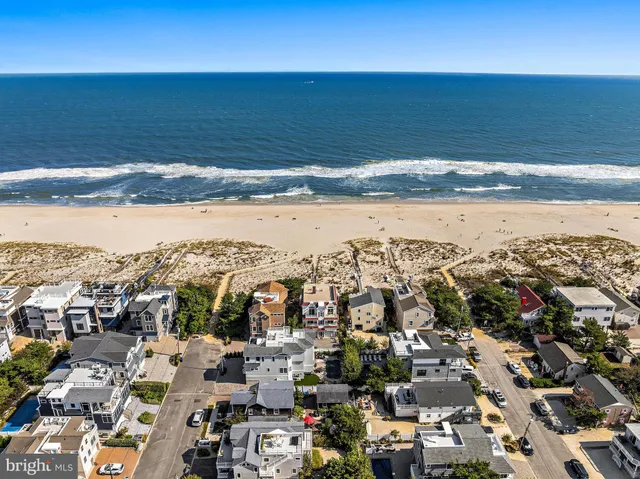 a spacious bathroom with a double vanity sink mirror and shower