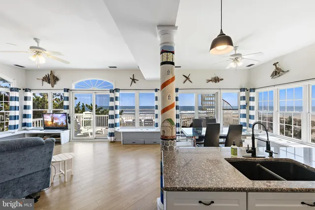 a room with pool table and flat screen tv