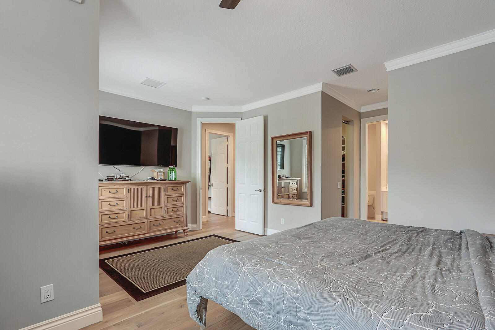 101 St Pierre Way Jupiter, FL 33458 - Photo 27 of 57 a bedroom with furniture and flat screen tv