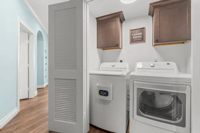 a utility room with dryer and washer