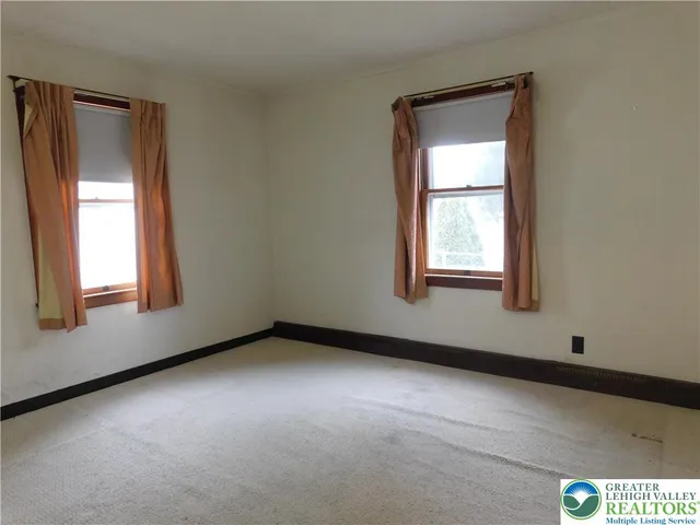 an empty room with a window