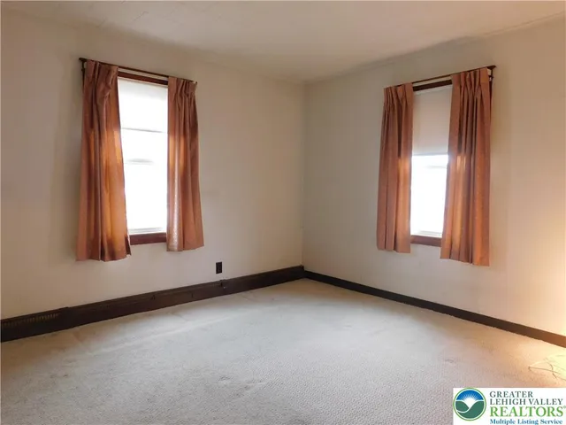 an empty room with a window