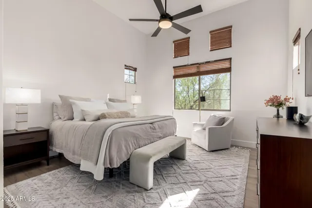 a kitchen with white cabinets and appliances
