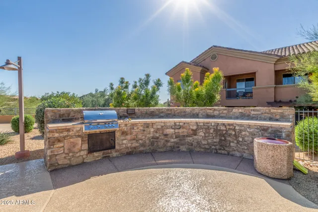 a view of a swimming pool with a yard