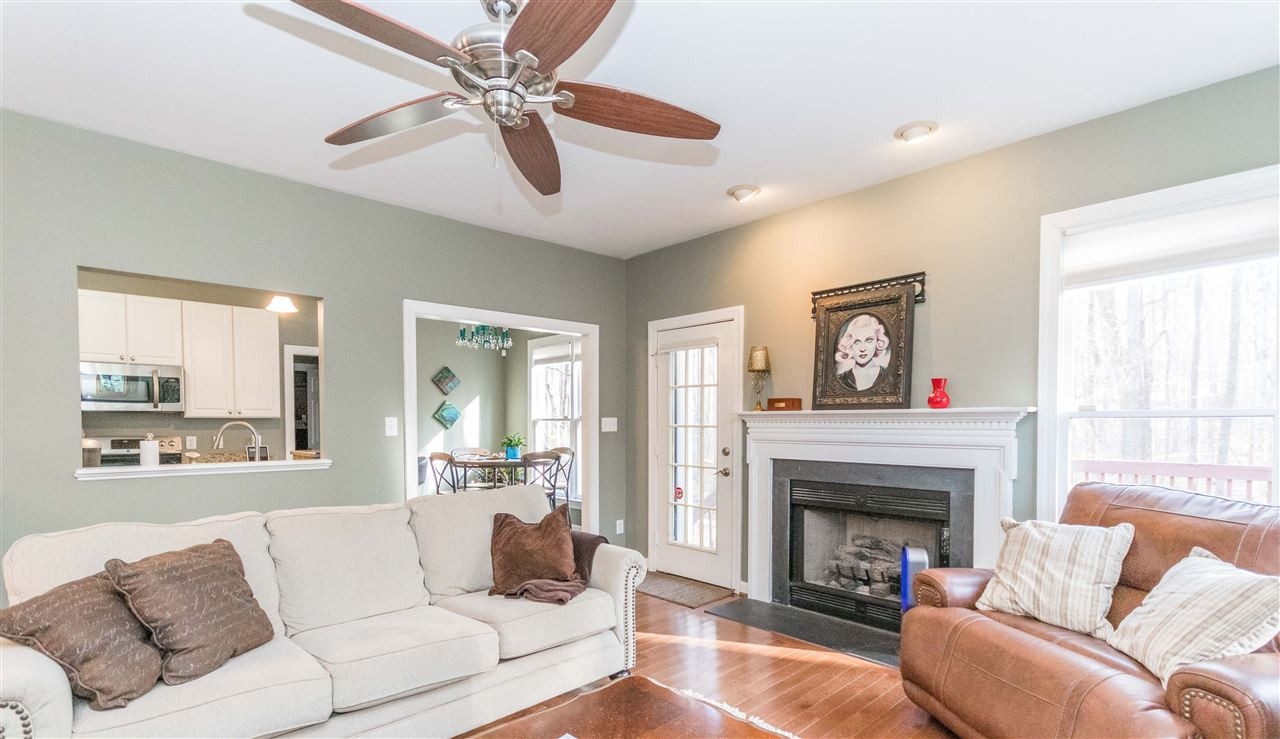 6020 Wild Orchid Trail Raleigh, NC 27613 - Photo 12 of 26 Cozy fireplace with gas logs to keep you toasty on these cold evenings! Living Room