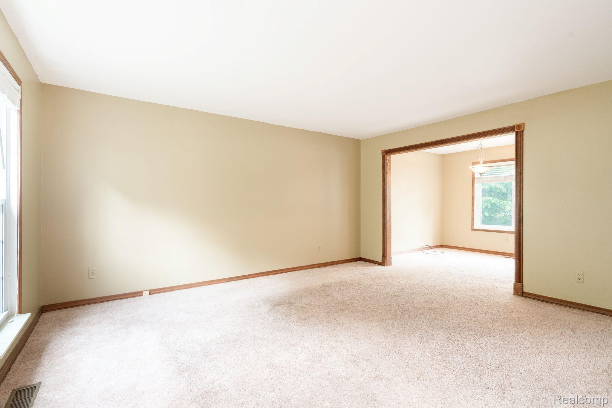 645 Worthington Road Canton, MI 48188 - Photo 10 of 30 Living Room with View of Dining Room