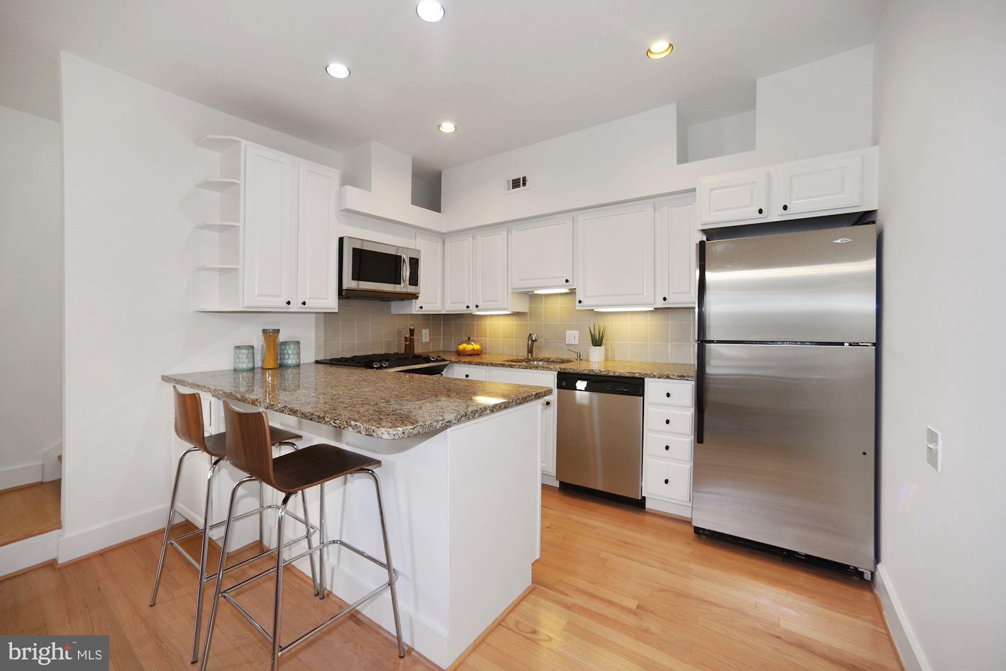 RENOVATED KTICHEN WITH BREAKFAST BAR