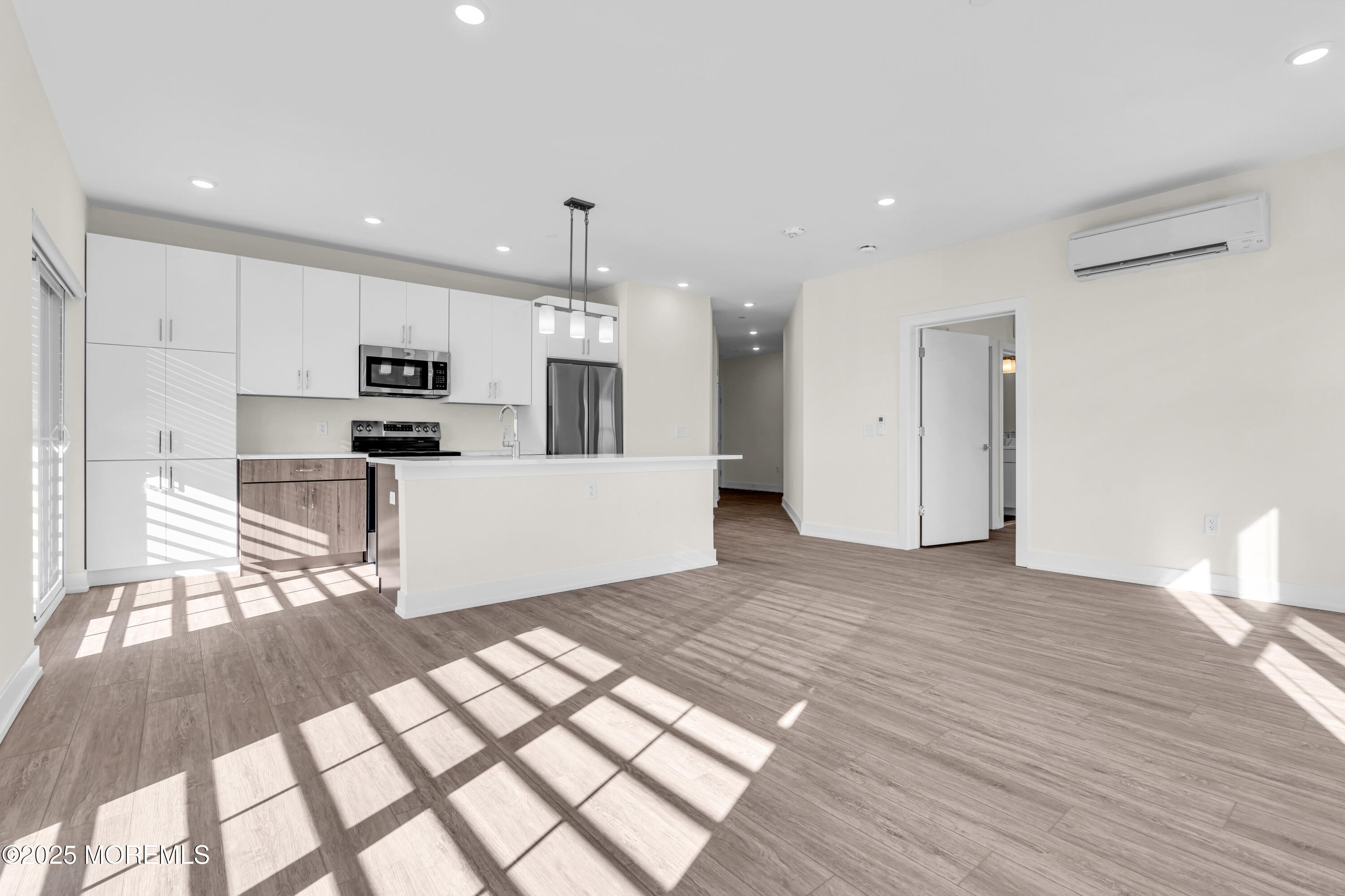 19 Carr Avenue, Unit 219 Keansburg, NJ 07734 - Photo 15 of 22 a view of a kitchen with microwave and cabinets