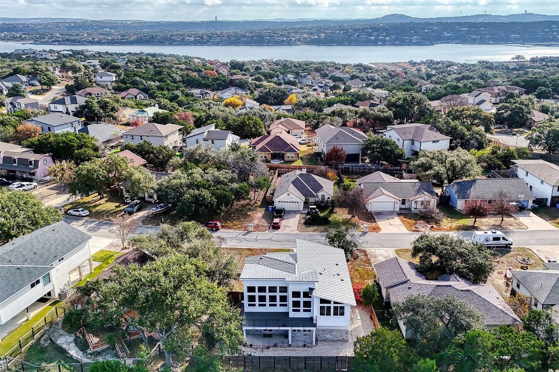 300 Summit Ridge Drive North Point Venture, TX 78645 - Photo 27 of 35 Aerial view of residential area and nearby Lake Travis