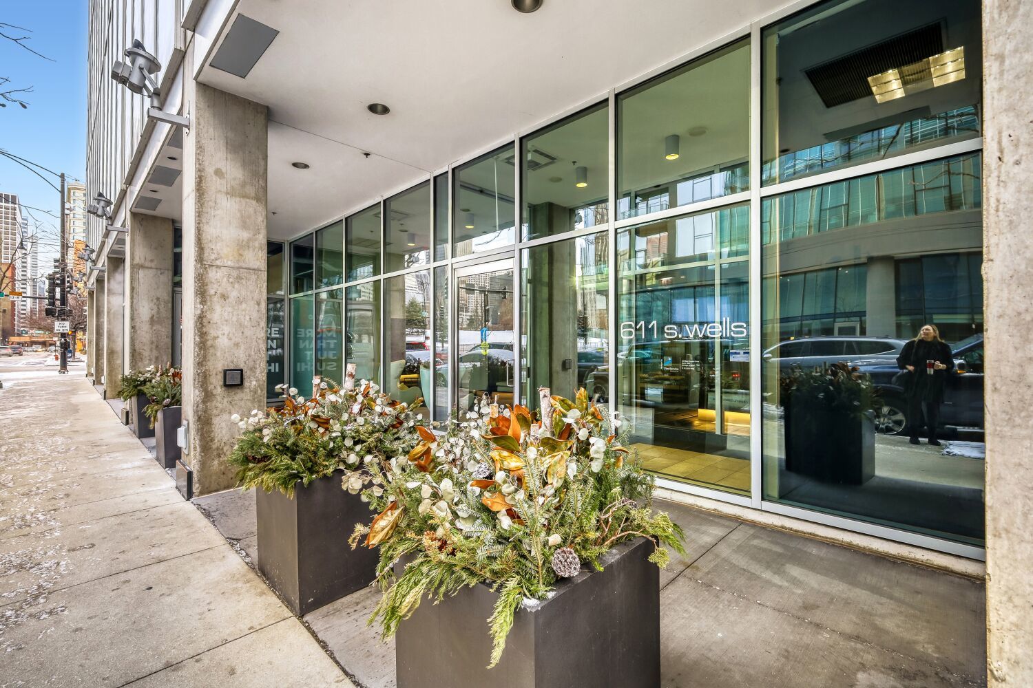611 South Wells Street, Unit 2304 Chicago, IL 60607 - Photo 18 of 20 a front view of a house with a porch