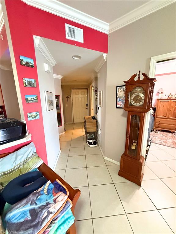 8490 Kingbird Loop, Unit 930 Estero, FL 33967 - Photo 8 of 12 a living room with furniture and a flat screen tv