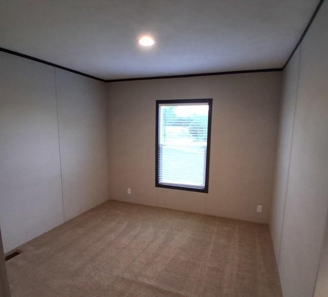 798 North 4190 Road Hugo, OK 74743 - Photo 10 of 16 an empty room with a window