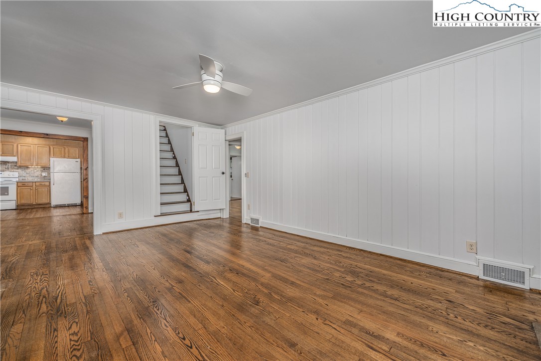 217 Highland Avenue Boone, NC 28607 - Photo 24 of 33 a view of an empty room with wooden floor