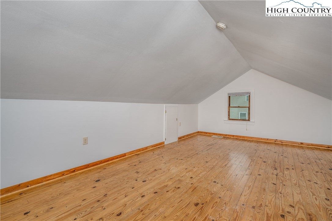 217 Highland Avenue Boone, NC 28607 - Photo 27 of 33 a view of empty room with wooden floor