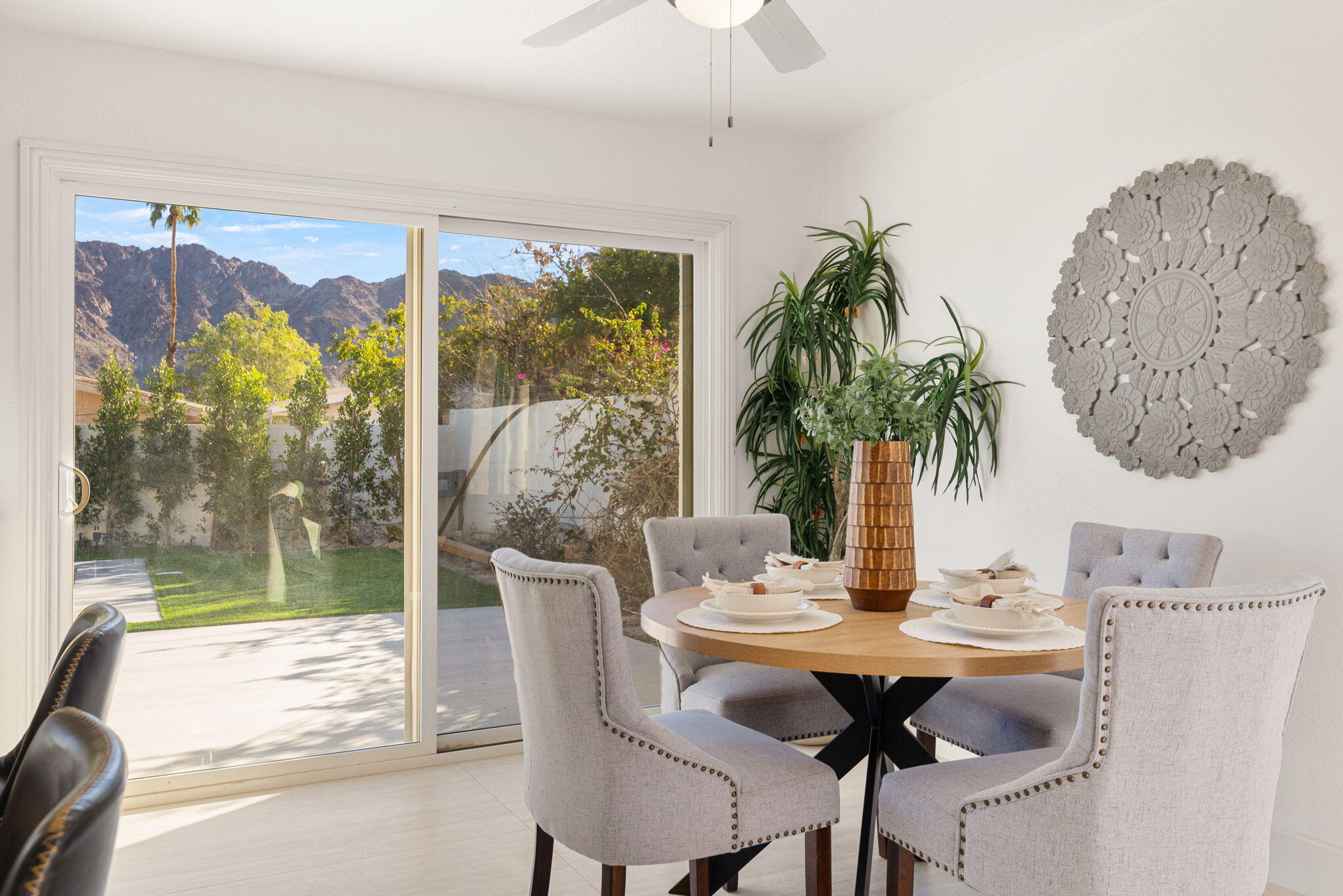 53770 Avenida Obregon La Quinta, CA 92253 - Photo 12 of 36 a view of a dining room with furniture window and outside view
