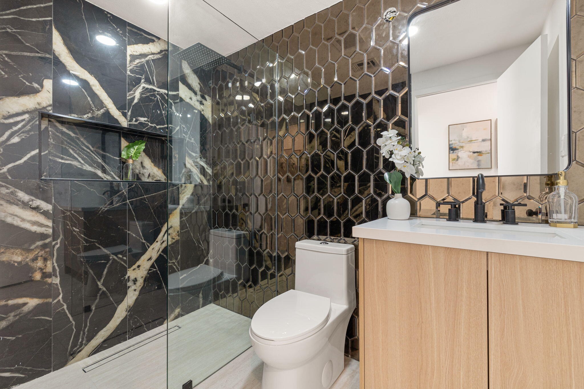 53770 Avenida Obregon La Quinta, CA 92253 - Photo 17 of 36 a bathroom with a granite countertop sink and a toilet