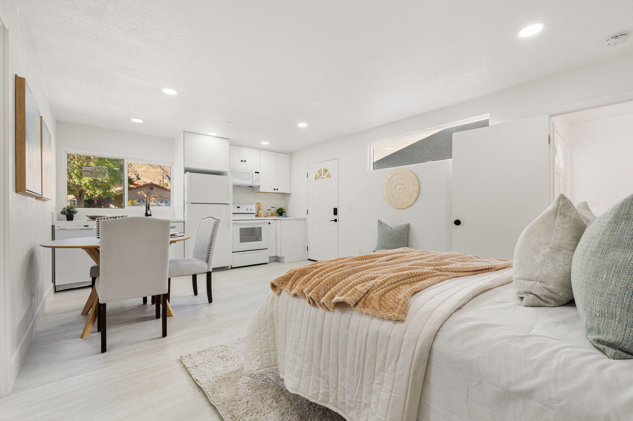 53770 Avenida Obregon La Quinta, CA 92253 - Photo 23 of 36 a bed room with a bed and a chair