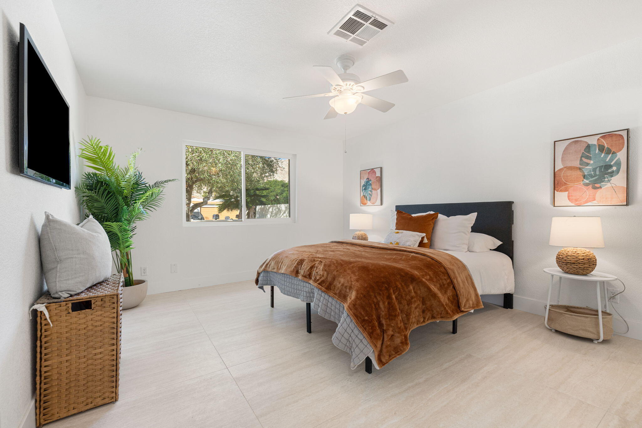 53770 Avenida Obregon La Quinta, CA 92253 - Photo 29 of 36 a bedroom with a bed and window