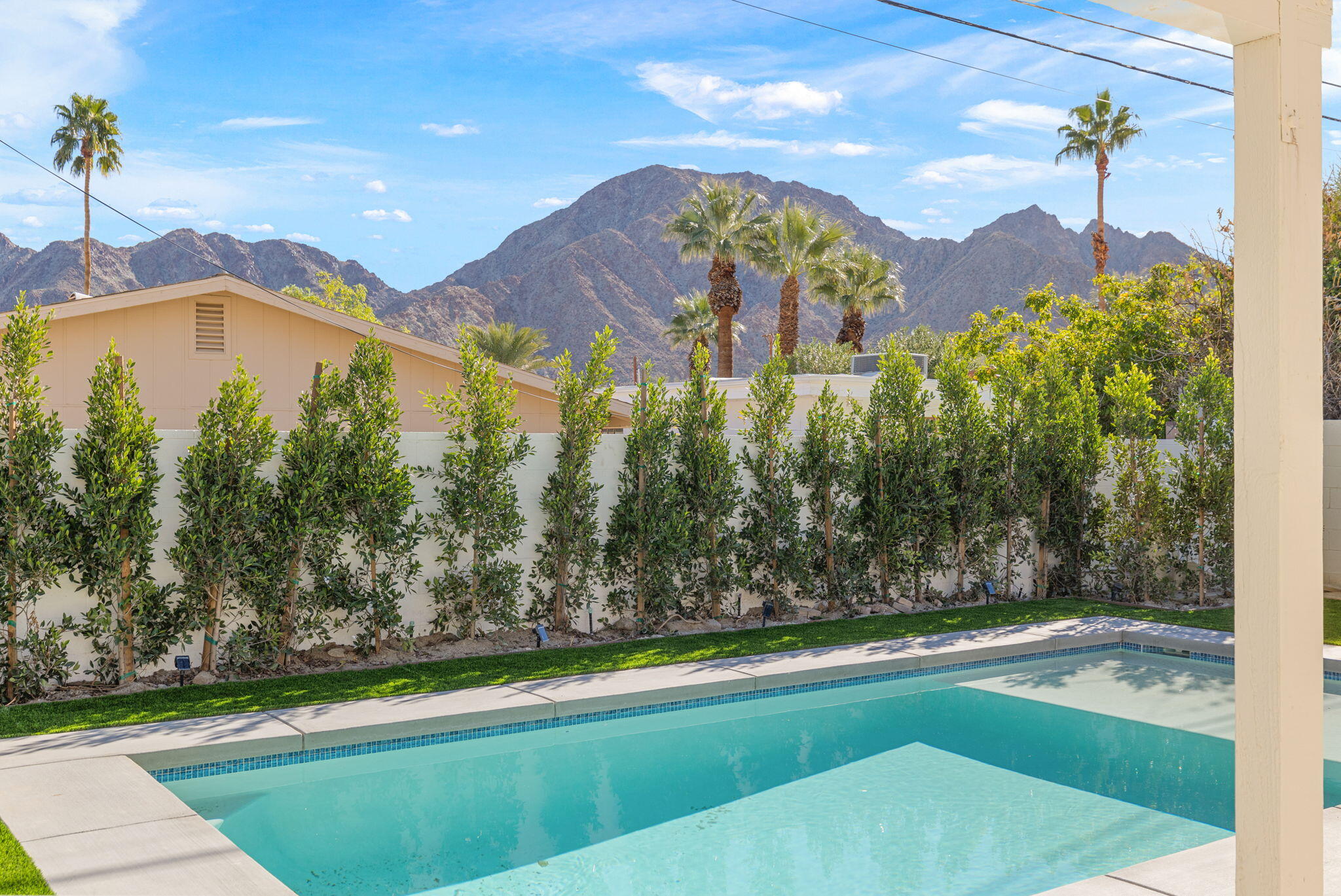 53770 Avenida Obregon La Quinta, CA 92253 - Photo 33 of 36 a view of swimming pool with an outdoor space and seating area