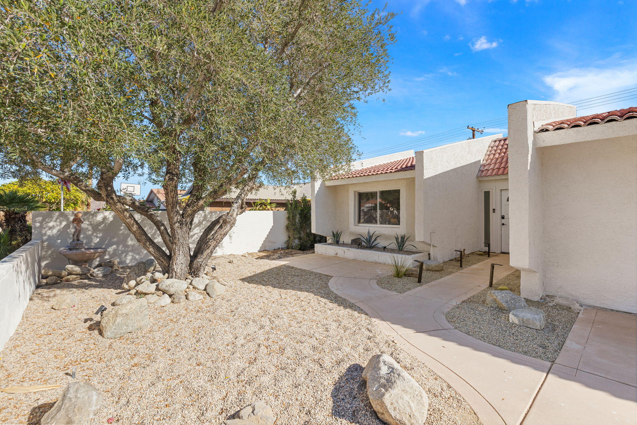 53770 Avenida Obregon La Quinta, CA 92253 - Photo 5 of 36 a view of a backyard with sitting area