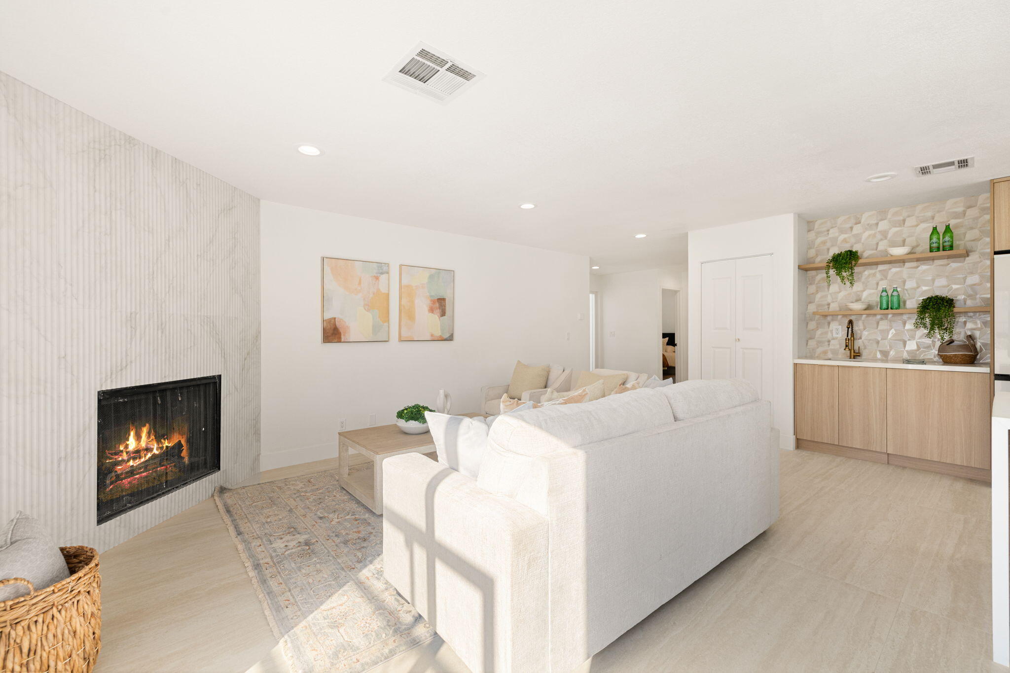 53770 Avenida Obregon La Quinta, CA 92253 - Photo 7 of 36 a living room with furniture and a fireplace