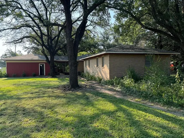 a house view with a garden space