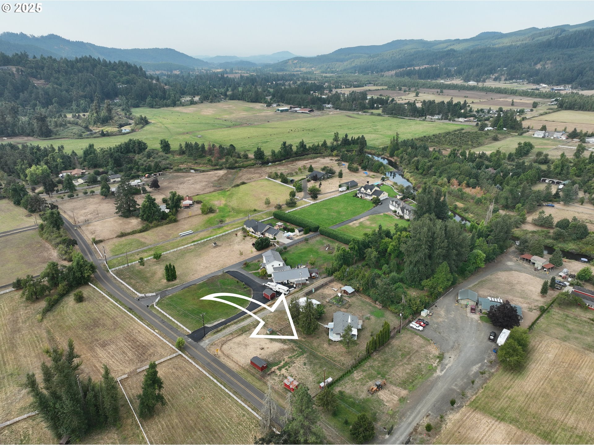 90948 Sunderman Road Springfield, OR 97478 - Photo 39 of 44 an aerial view of residential houses with outdoor space and river