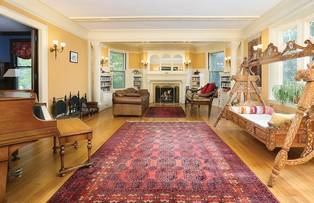 23 Philbrick Road Brookline, MA 02445 - Photo 2 of 10 a living room with furniture windows and a fireplace