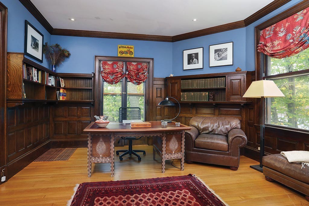 23 Philbrick Road Brookline, MA 02445 - Photo 5 of 10 a living room with furniture and a fireplace