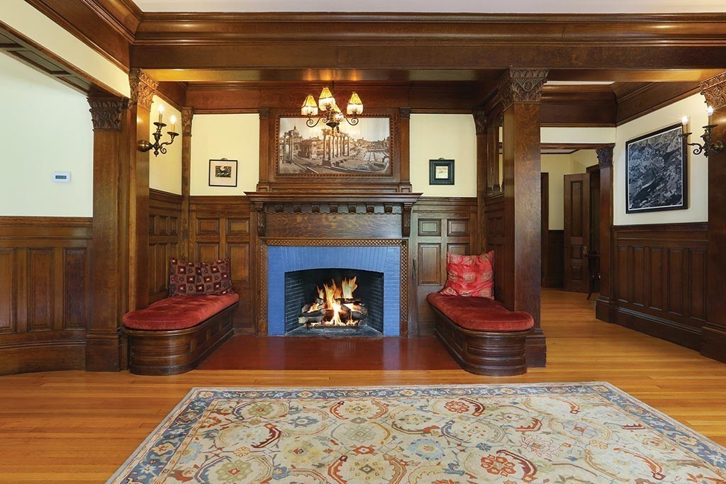 23 Philbrick Road Brookline, MA 02445 - Photo 6 of 10 a living room with furniture and a fireplace